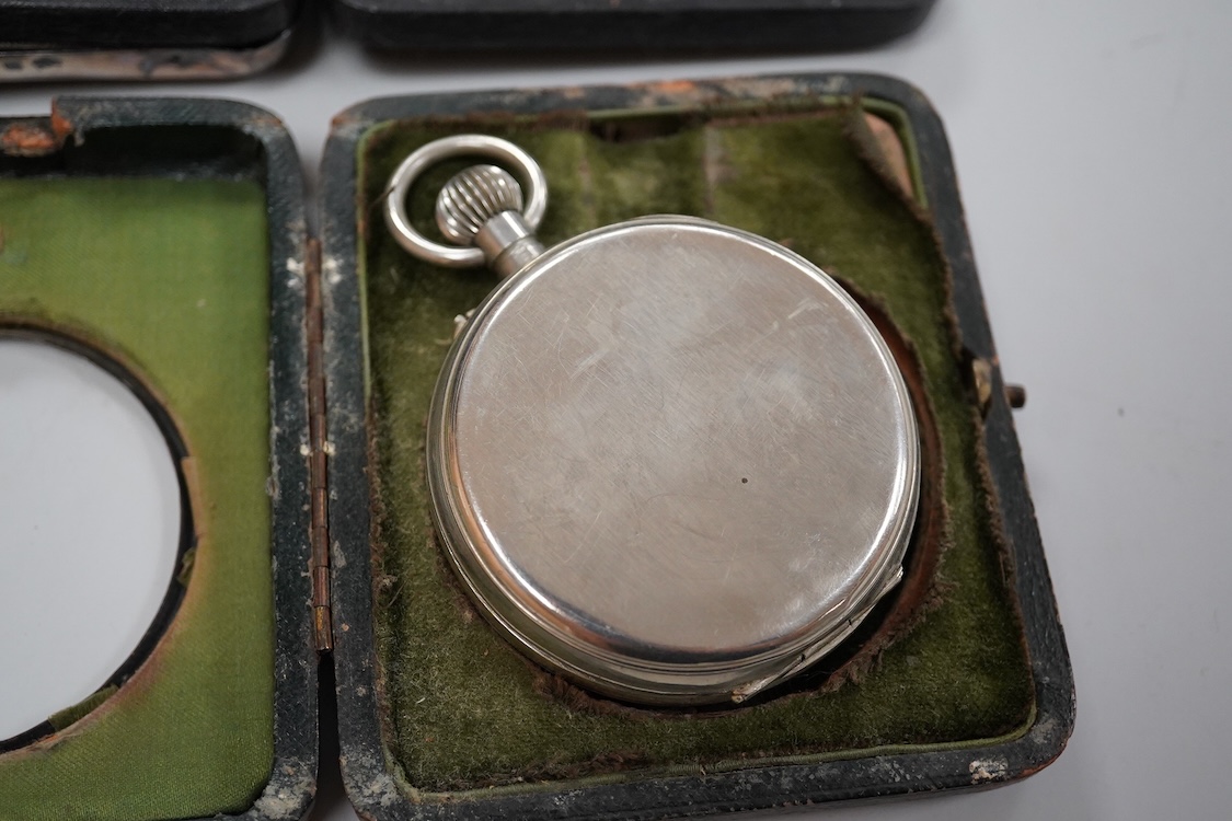 Two George V silver mounted travelling watch cases, both Birmingham, 1921, both containing chrome cased pocket watches. largest case 11.4cm.